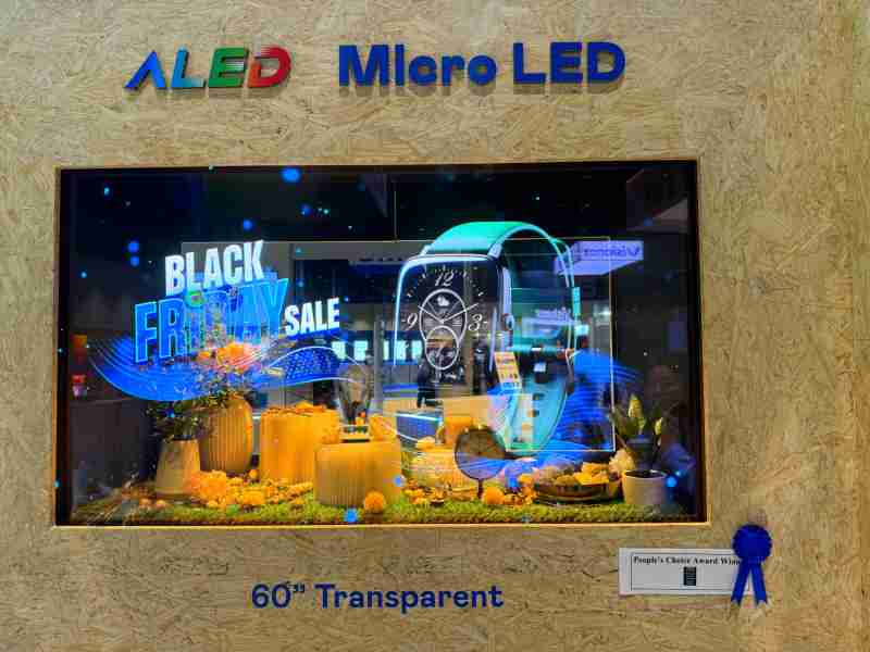 口袋牛店60吋高透明度Micro LED显示器获”最佳Micro LED技术应用奖”，，，将Micro LED面板透明化之设计特性极致发挥，，，，以可扩展性无缝拼接技术打造，，，具备600 nits全画面亮度、、、大于60%穿透率及超过NTSC 110%的优异广色域表现，，，，可依需求灵活应用于各种场域